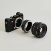 Urth objektív adapter Canon EF/EF-S - Leica L